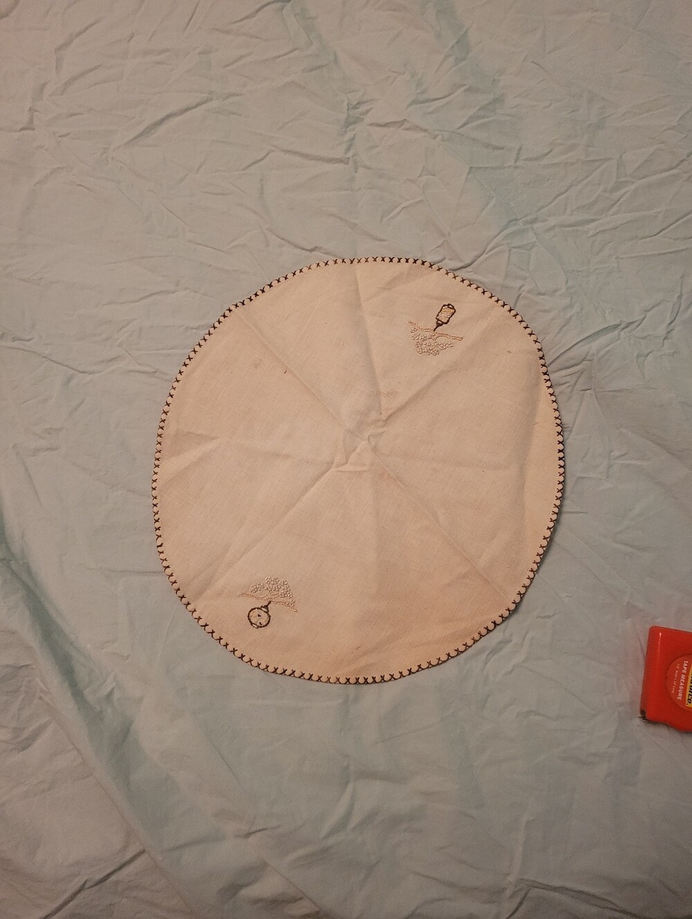 Round Embroidered Linen Doily in Cream with Black Trim